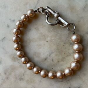 Elegant cream colored Pearl Bracelet (faux) with silver toggle